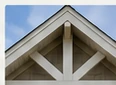 Detailed gable trim example for a premium exterior paint and stain package.