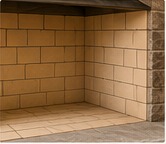 Full refractory firebox interior with masonry firebrick surfaces.