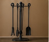 Heavy-duty fireplace tools and accessories for wood-burning fireplace operation.