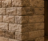 Close-up of handcrafted stone or brick masonry construction.