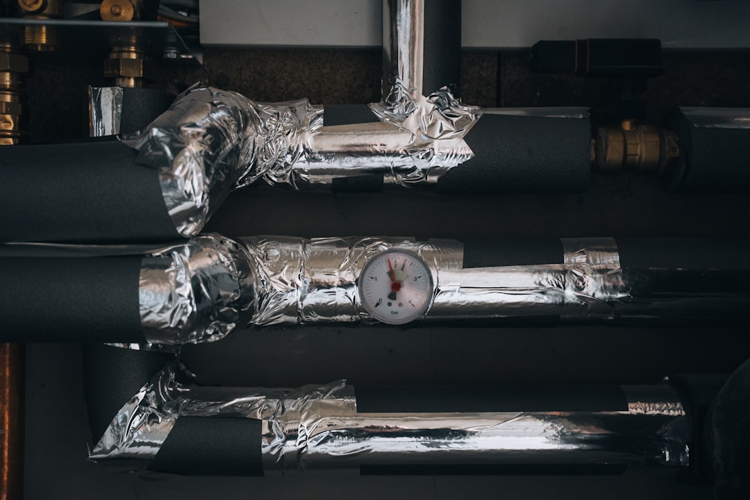 HVAC rough-in view showing duct trunks, returns, and equipment placement for a two-story home